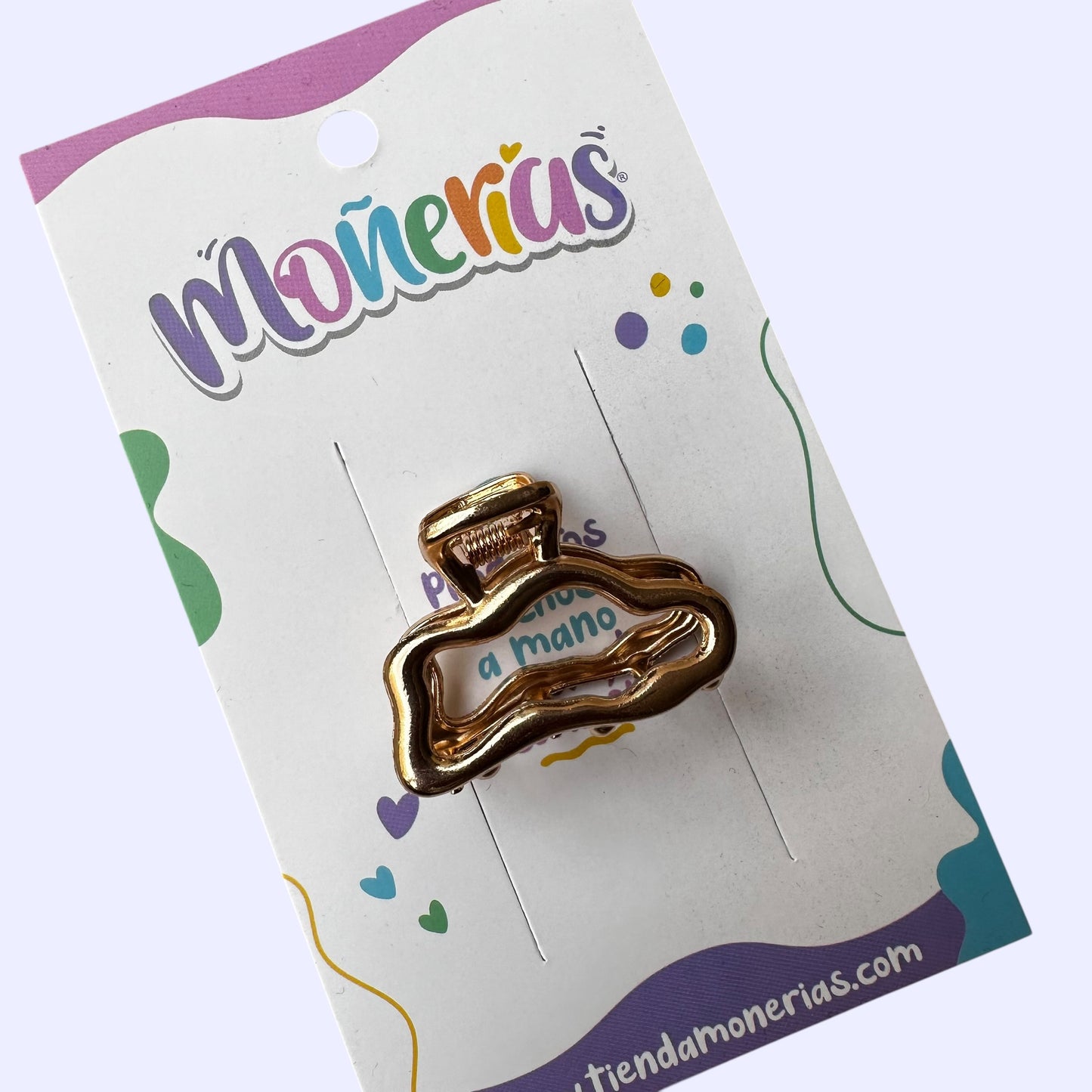 Pinza chica metálica dorada